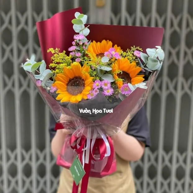 Bó Hoa Hướng Dương Tốt Nghiệp Tươi Thắm 5 31364E50 FFBF 4AA0 B053 3A8A0DBDBCEE e1705338855797